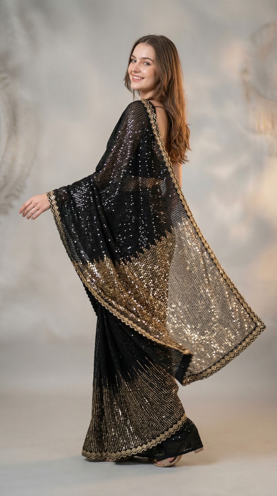 Black Georgette Saree with all over Sequence Work and Lace Border